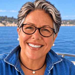 Marie Tyler Wiley smiling beside the water
